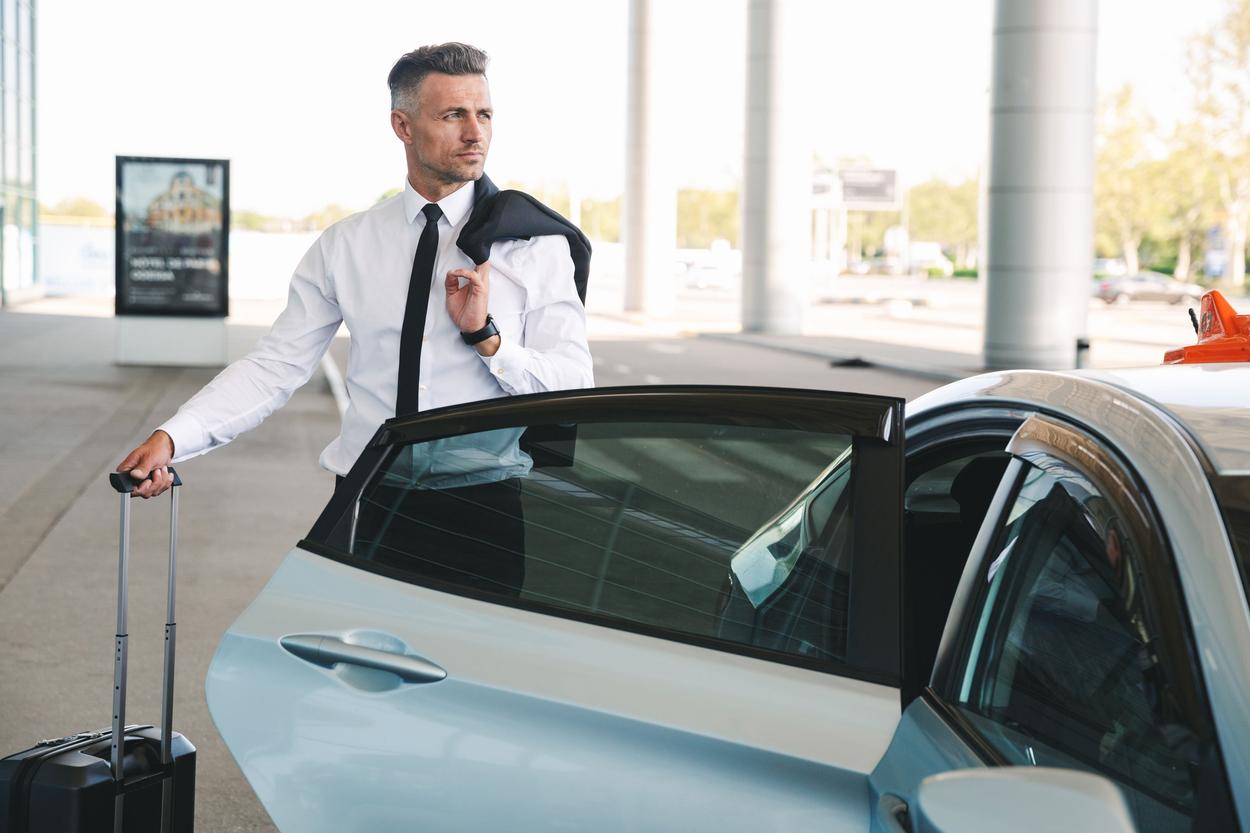 men coming out of car
